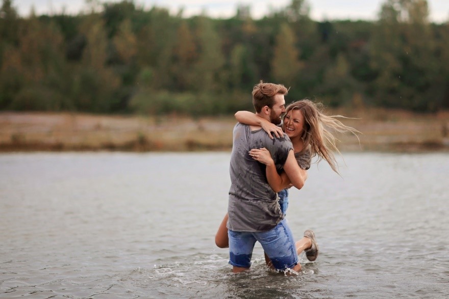 photo of a couple in the water