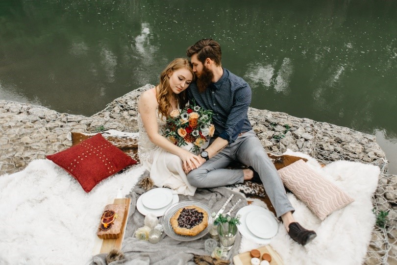 photo of a couple by the water